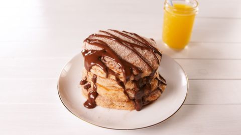 churro pancakes topped with chocolate