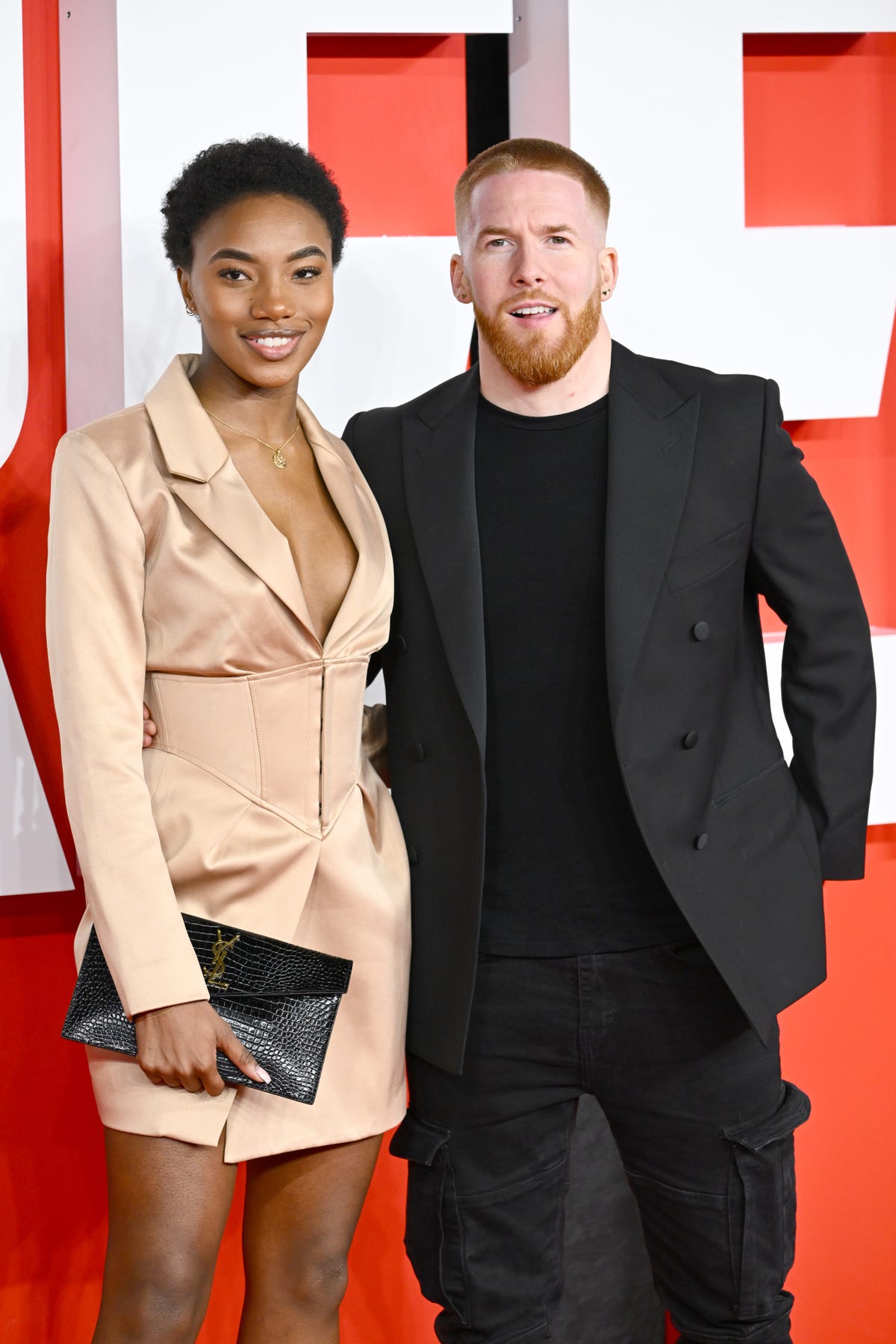 preview for Strictly's Neil Jones lets Love Island girlfriend tattoo his leg