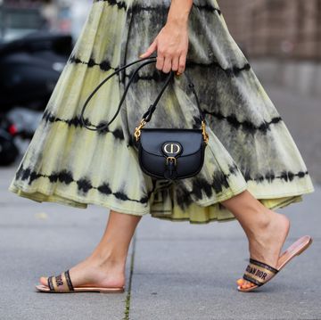 berlin, germany   july 29 sonia lyson is seen wearing tshirt the frankie shop, dior bobby bag, dior skirt with print, dior sandals, linda farrow x the attico on july 29, 2020 in berlin, germany photo by christian vieriggetty images