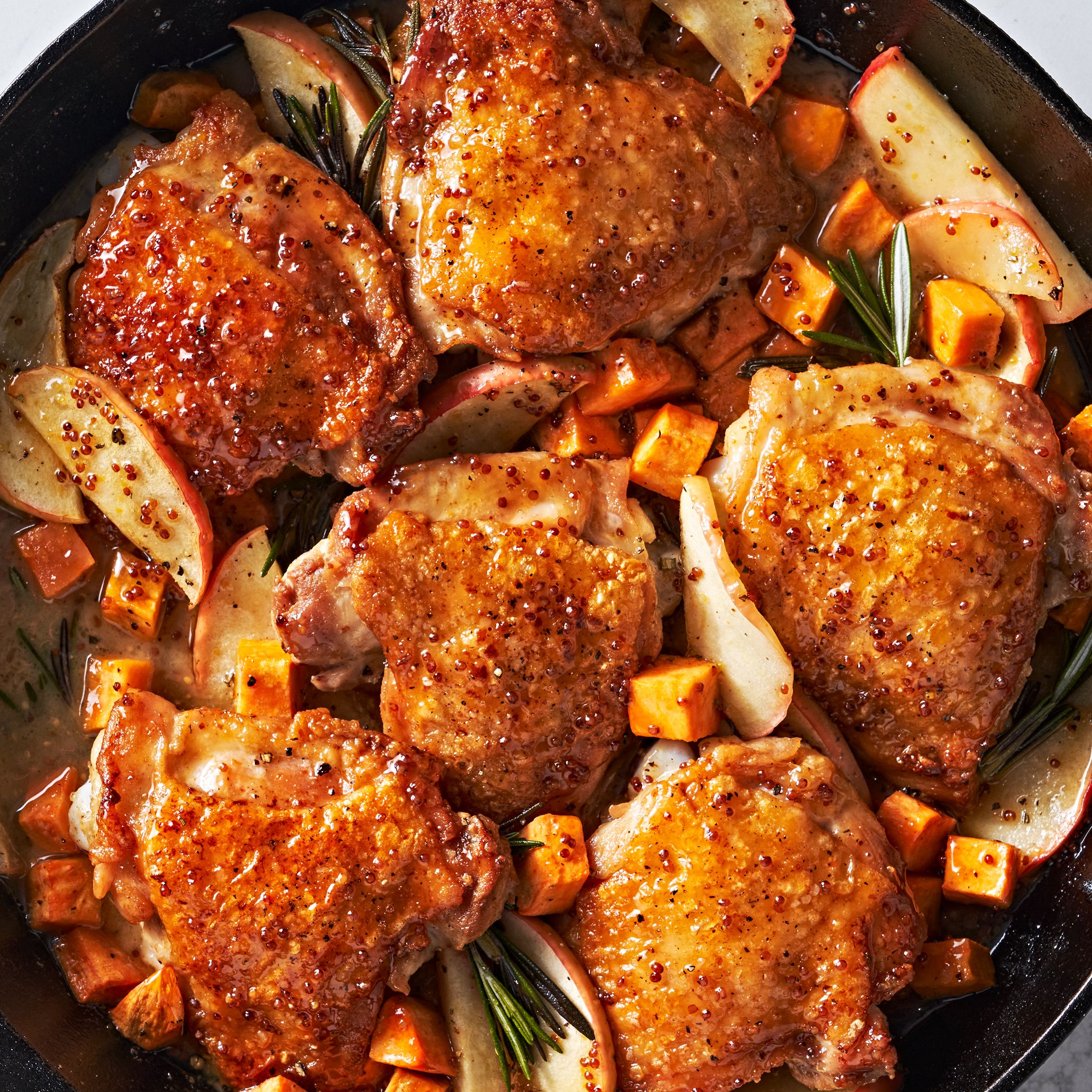 https://hips.hearstapps.com/hmg-prod/images/cider-glazed-chicken-thighs-lead-65295bb809e8f.jpg