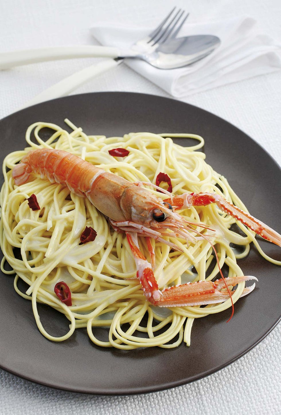 Cigalas con fideos de arroz