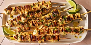 grilled chicken on skewers with lime