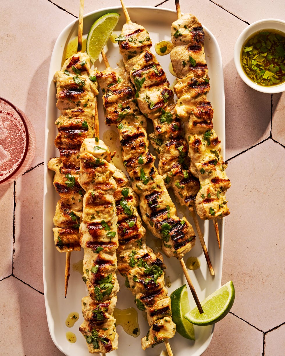 grilled chicken on skewers with lime