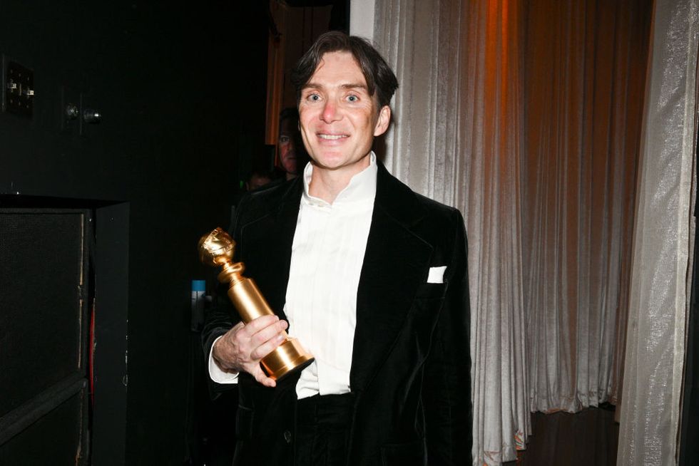 cillian murphy with red lipstick on his nose