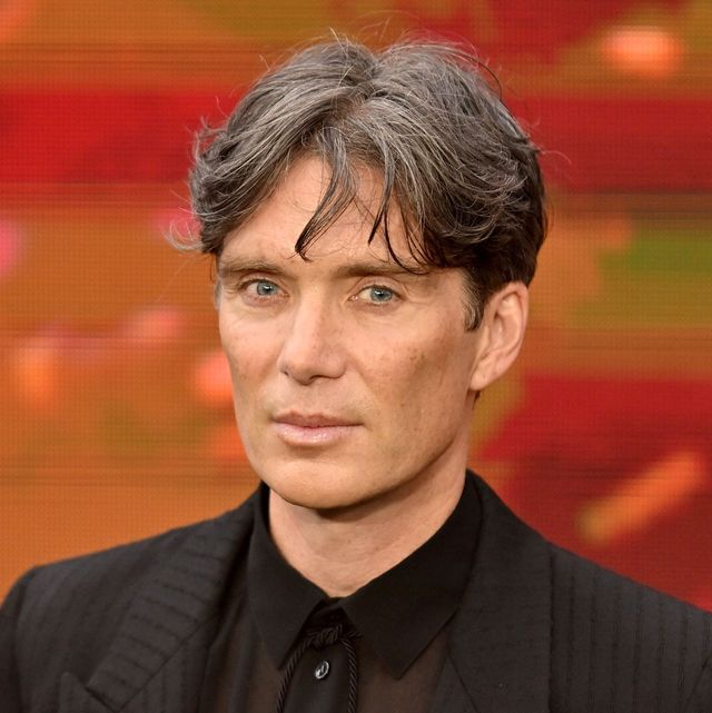 cillian murphy posing for a photograph at a premiere event
