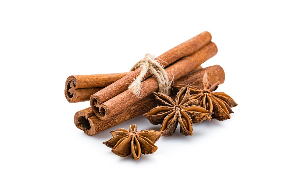 aromatherapy cinnamon sticks and star anise isolated on white background