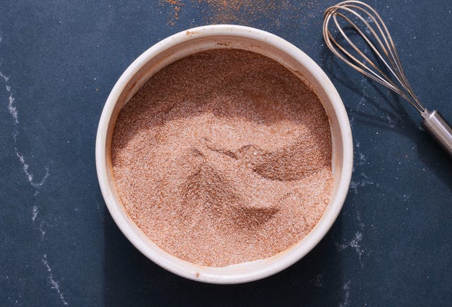 cinnamon sugar in a bowl and on buttered toast