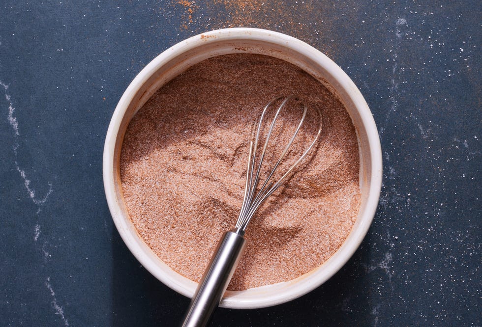 cinnamon sugar in a bowl and on buttered toast