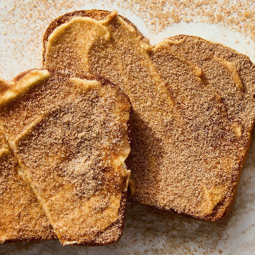 toast slices spread with butter and sprinkled with cinnamon sugar