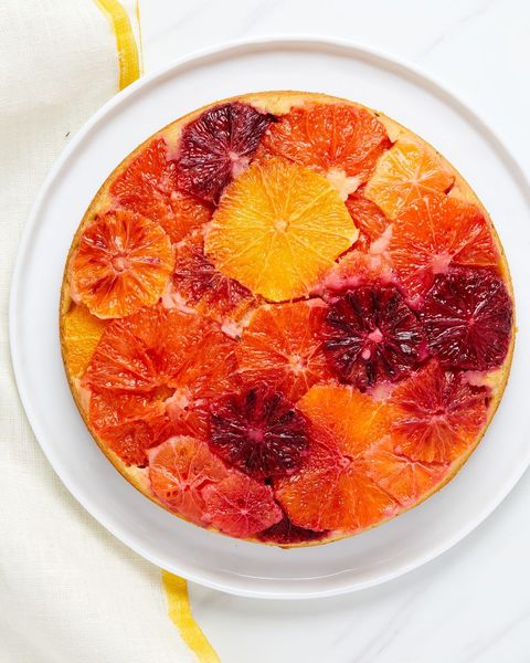 citrus upside down cake on a white plate