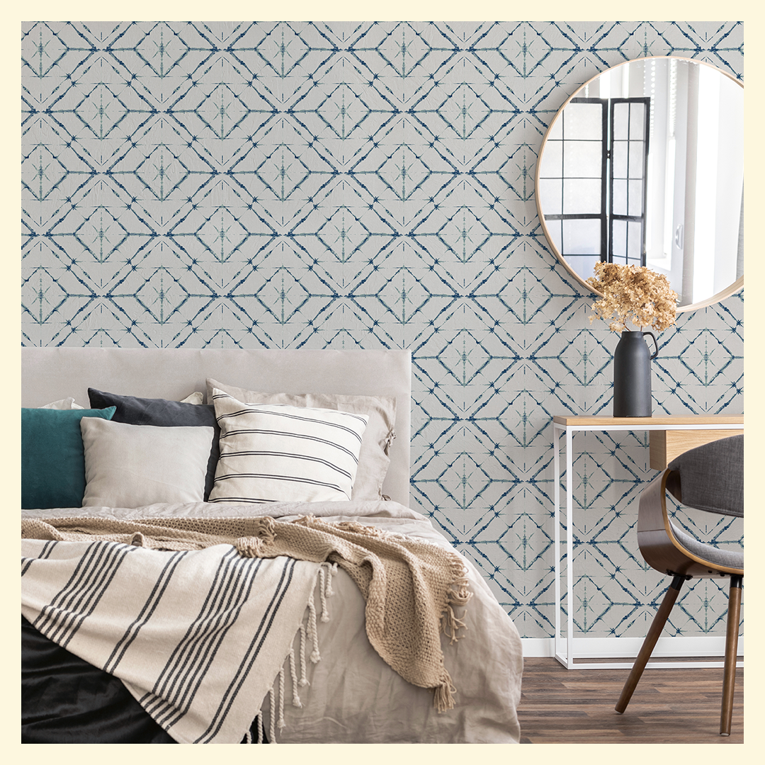 bedroom with geometric wallpaper