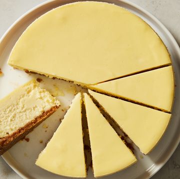 classic cheesecake with graham cracker crust, cut into slices