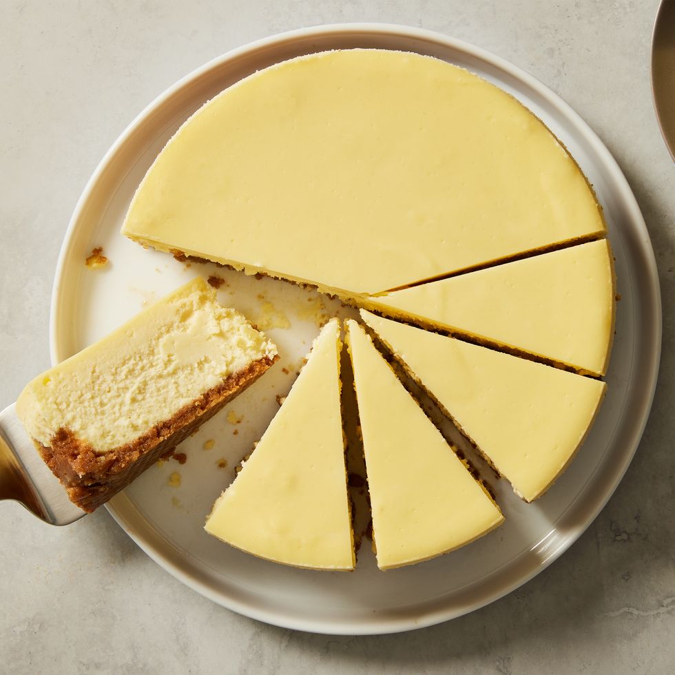 classic cheesecake with graham cracker crust, cut into slices