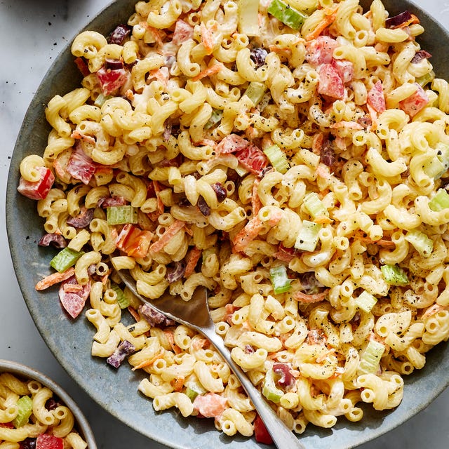 creamy macaroni salad with carrots, celery, and olives