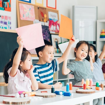 young kids in a colorful classroom