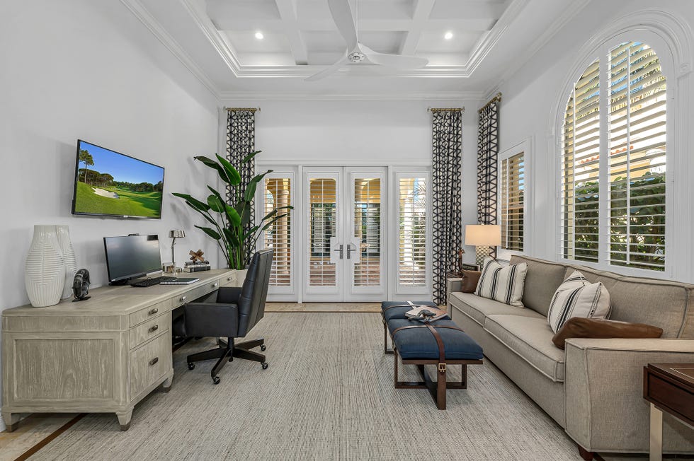 home office with louvered shutters