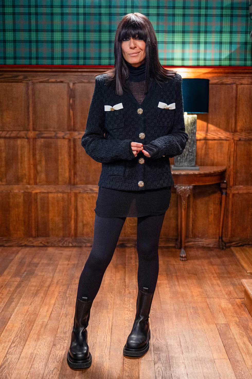 claudia winkleman traitors polo neck