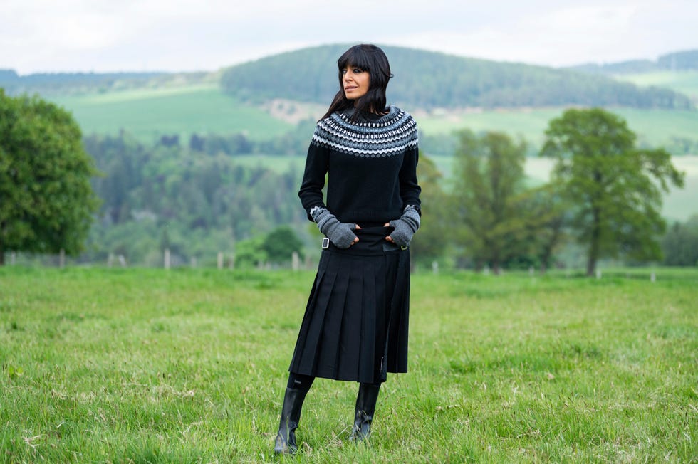 claudia winkleman traitors outfits