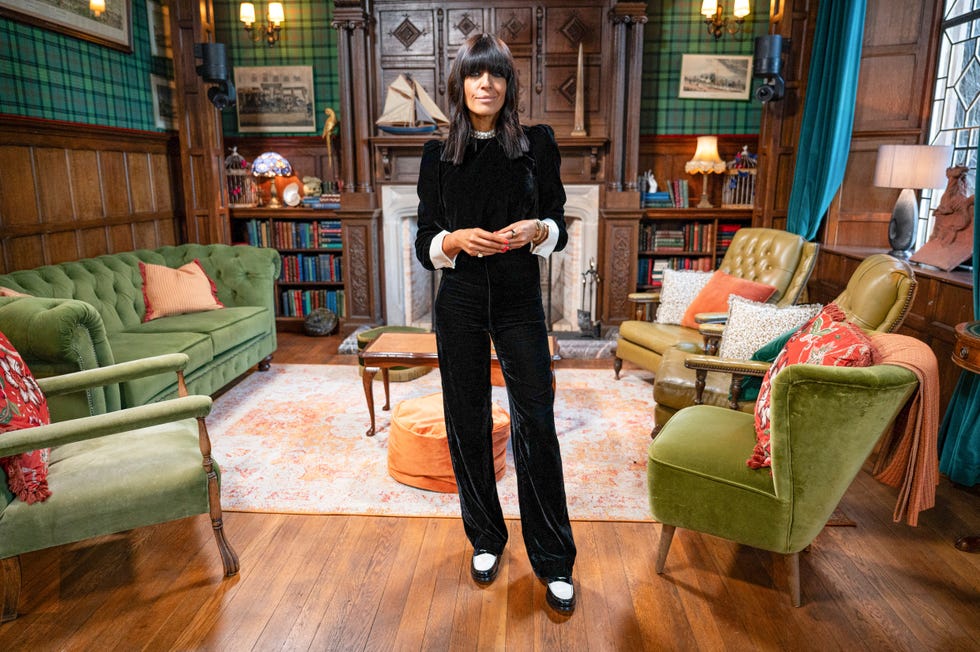 claudia winkleman traitors outfits