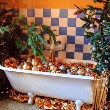 claw foot bathtub in the bathroom of casa vicens, designed by antoni gaudi and decorated for christmas and new years holidays