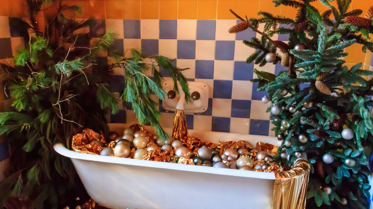 claw foot bathtub in the bathroom of casa vicens, designed by antoni gaudi and decorated for christmas and new years holidays