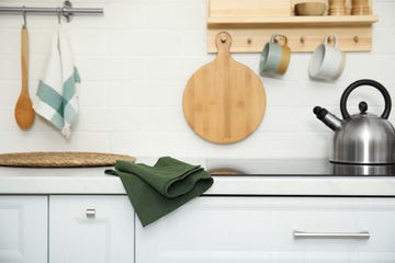 clean towel on white countertop in kitchen