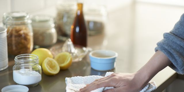 cleaning kitchen with natural cleaning products.