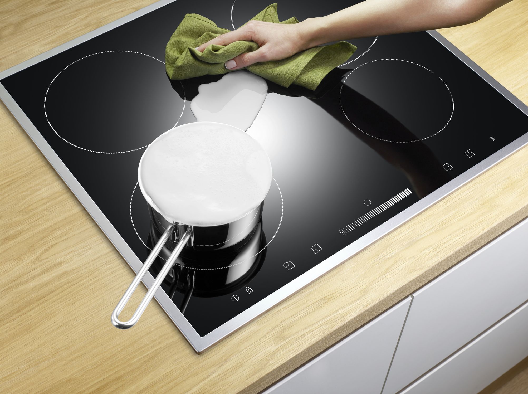 https://hips.hearstapps.com/hmg-prod/images/cleaning-set-top-stove-royalty-free-image-1695240415.jpg