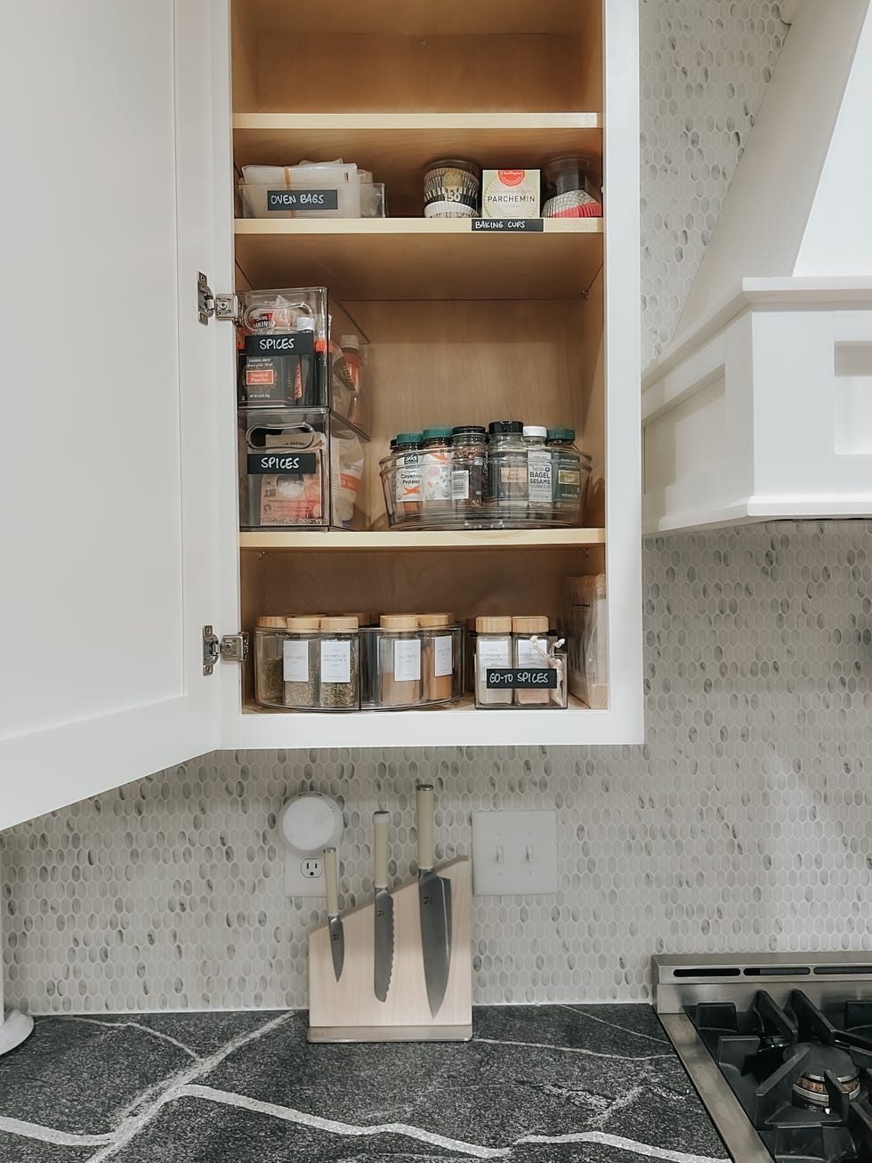 cabinet organized with bins