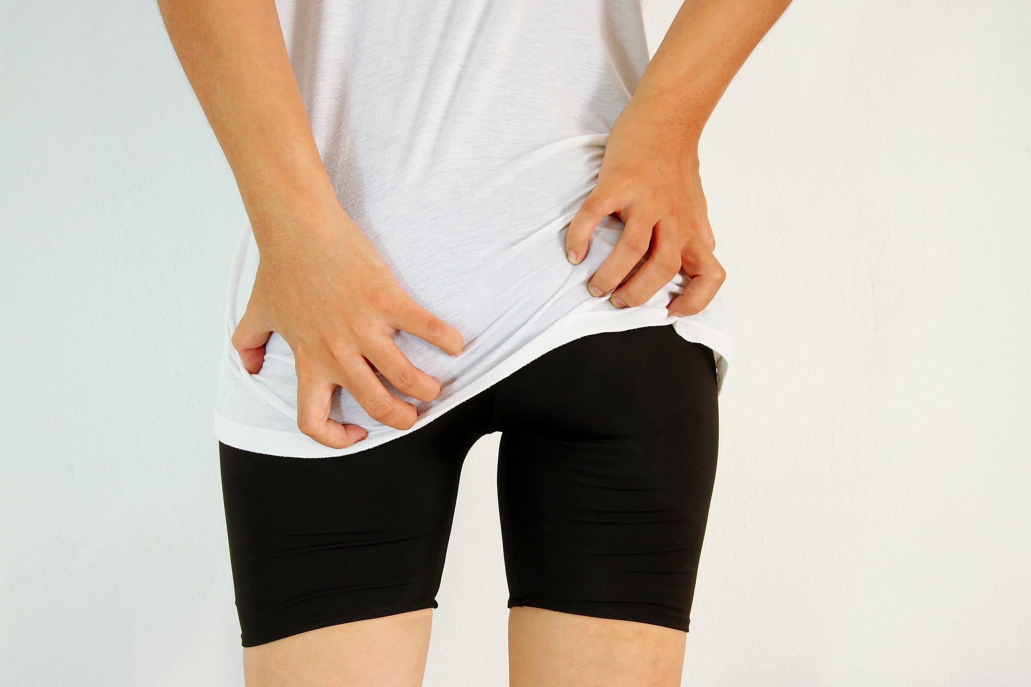 Young woman has itching the buttocks, Healthcare concept.