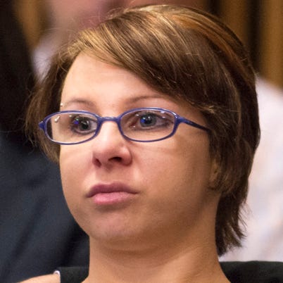 CLEVELAND, OH - AUGUST 1:  Michelle Knight (L) sits with her attorney during the sentencing of Ariel Castro on August 1, 2013 in Cleveland, Ohio. Castro was sentenced to life without parole plus one thousand years for abducting three women, including Knight, from 2002 and 2004 when they were between 14 and 21 years old. The women escaped this past May.  (Photo by Angelo Merendino/Getty Images) (Photo by Angelo Merendino/Getty Images)