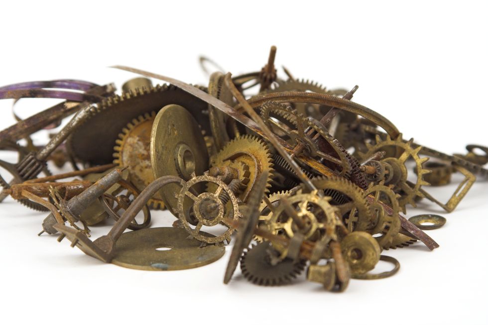 brass clock parts cogs and springs