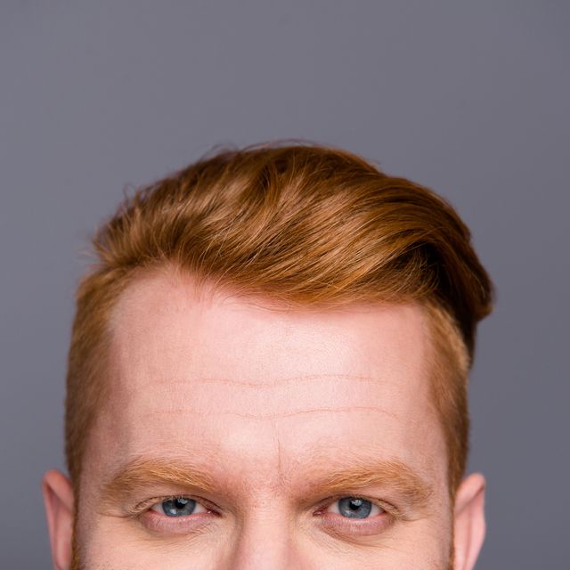 close up cropped portrait of nice content confident handsome attractive trendy macho man hipster fashionable haircut stylist isolated over grey pastel background