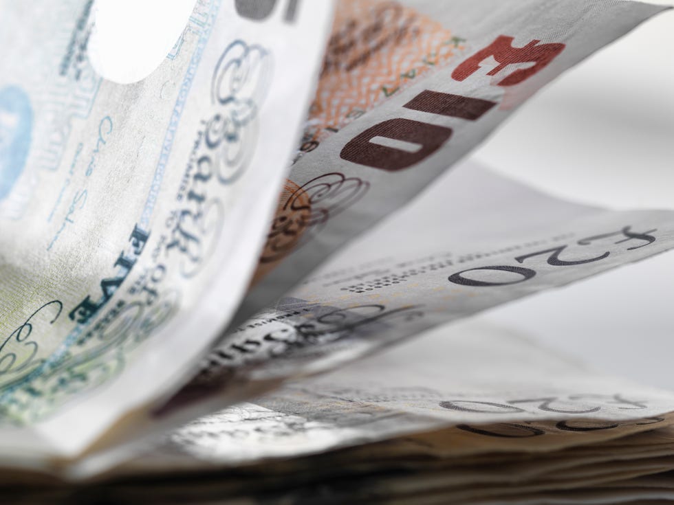 Close up detail of a stack of British banknotes