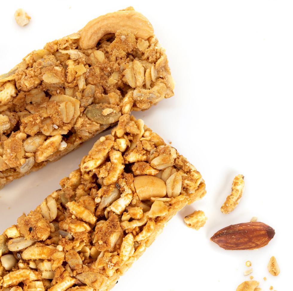 close up homemade healthy granola crunchy biscuit bars , vegan friendly snack , a healthy food concept