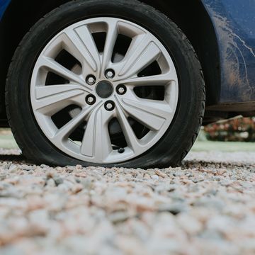 close up of a car's flat tire