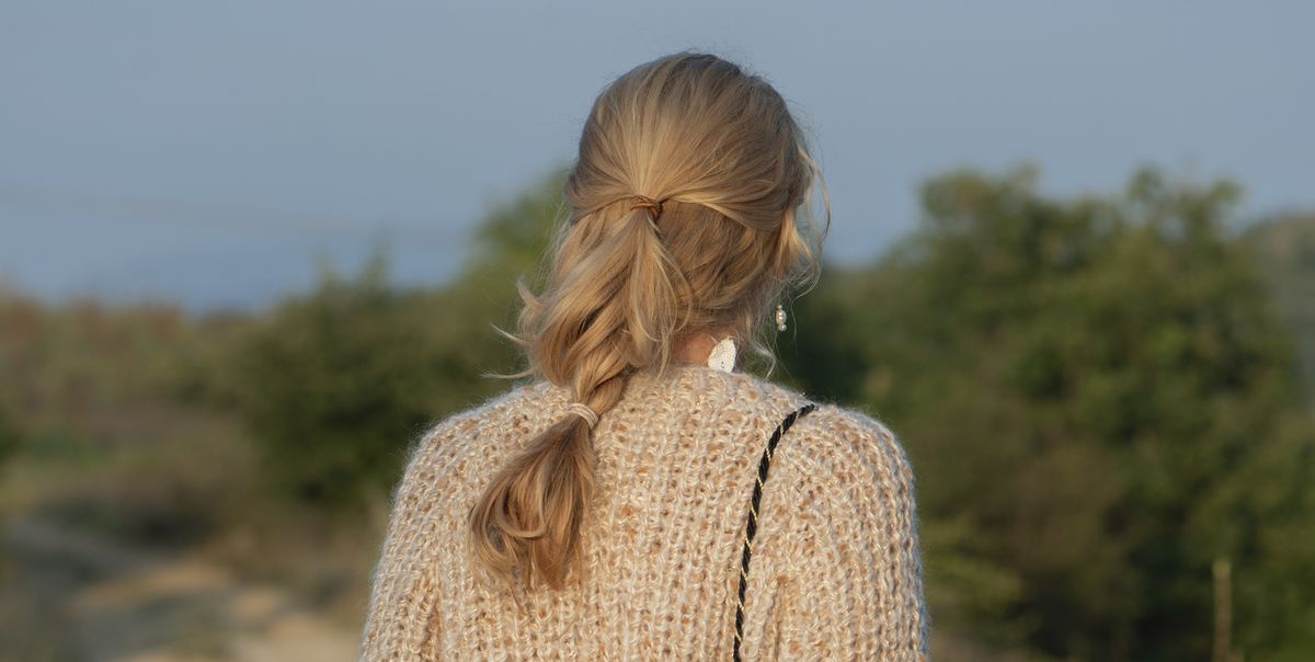 close up of a woman wearing handmade wool sweater