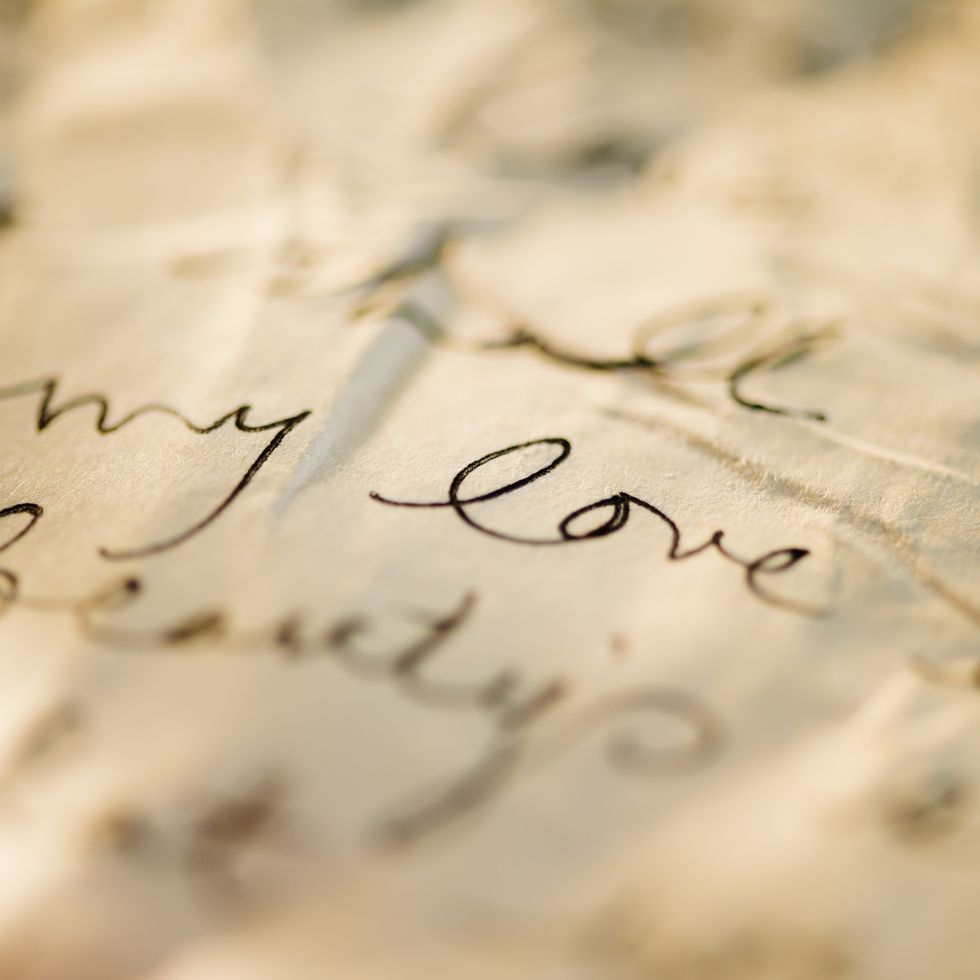close up of antique love letter on parchment 