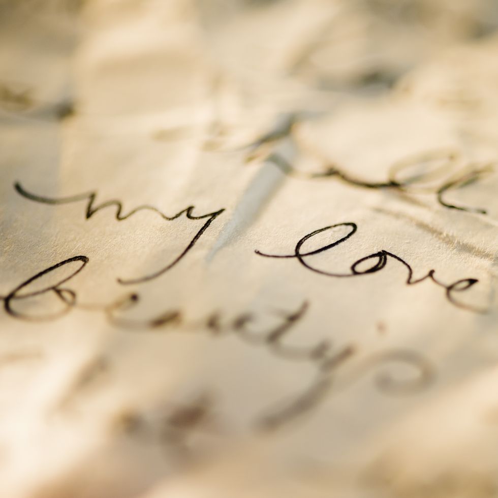 close up of antique love letter on parchment 