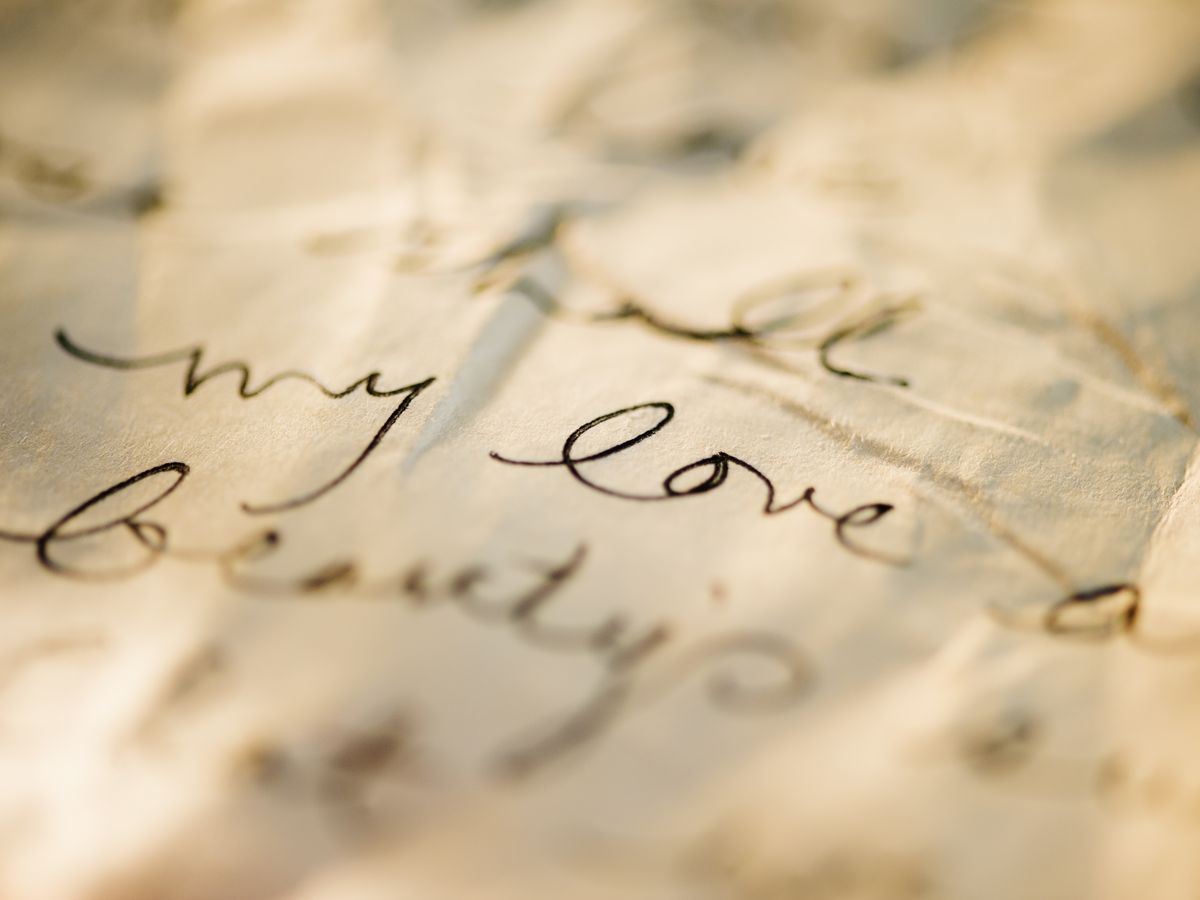 https://hips.hearstapps.com/hmg-prod/images/close-up-of-antique-love-letter-on-parchment-royalty-free-image-1698606306.jpg?crop=0.95458xw:1xh;center,top&resize=1200:*