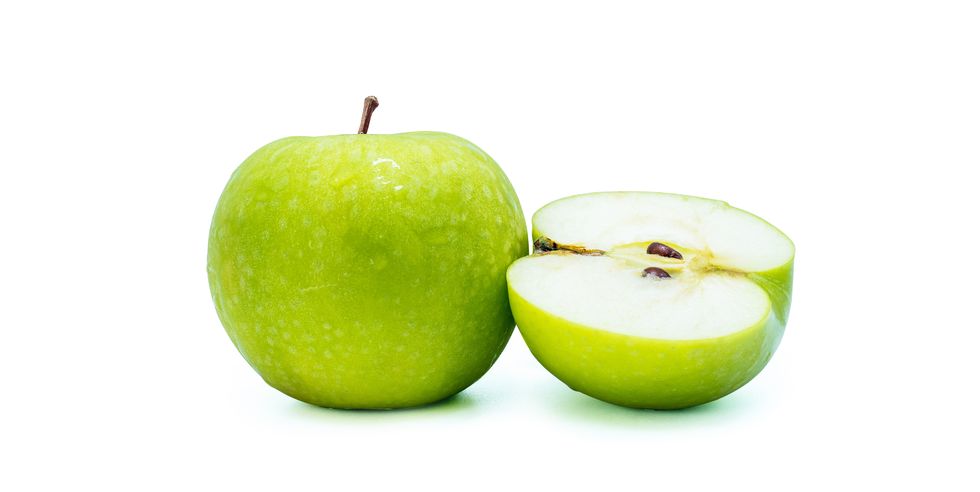 close up of apple against white background