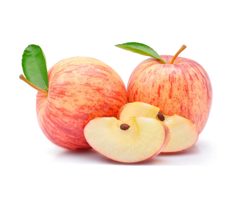 Close-Up Of Apples Against White Background