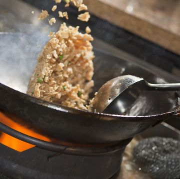 close up of asian stir fry cooking in a wok