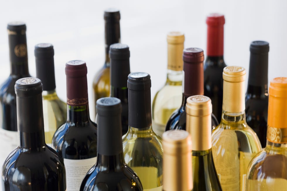 close up of assorted wine bottles