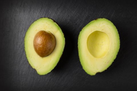 Close-Up Of Avocado Against Black Background