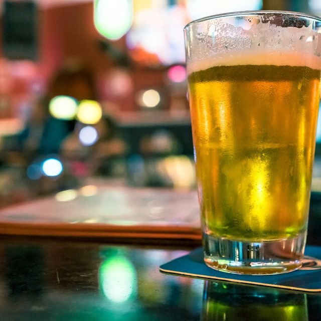 Close-Up Of Beer Glass On Table In Restaurant