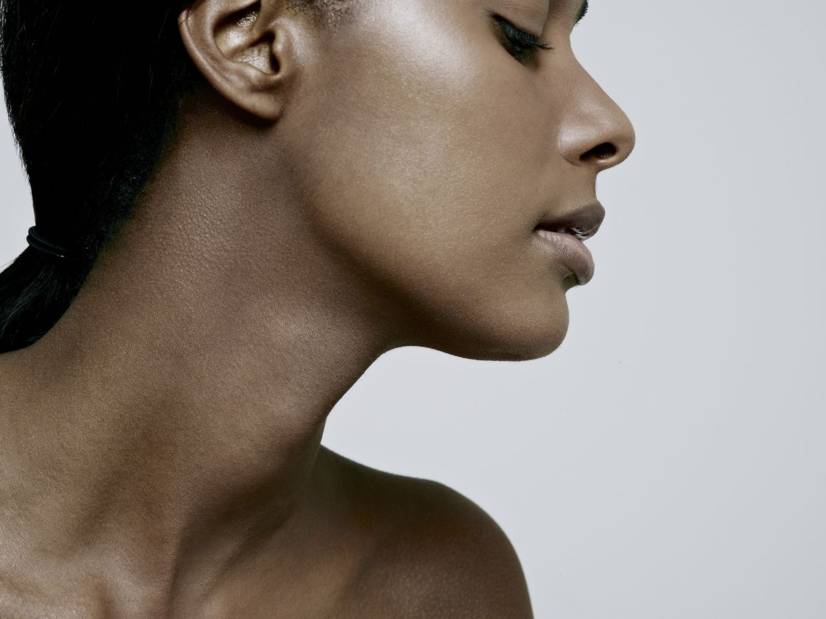close up of black girl side of face and neck