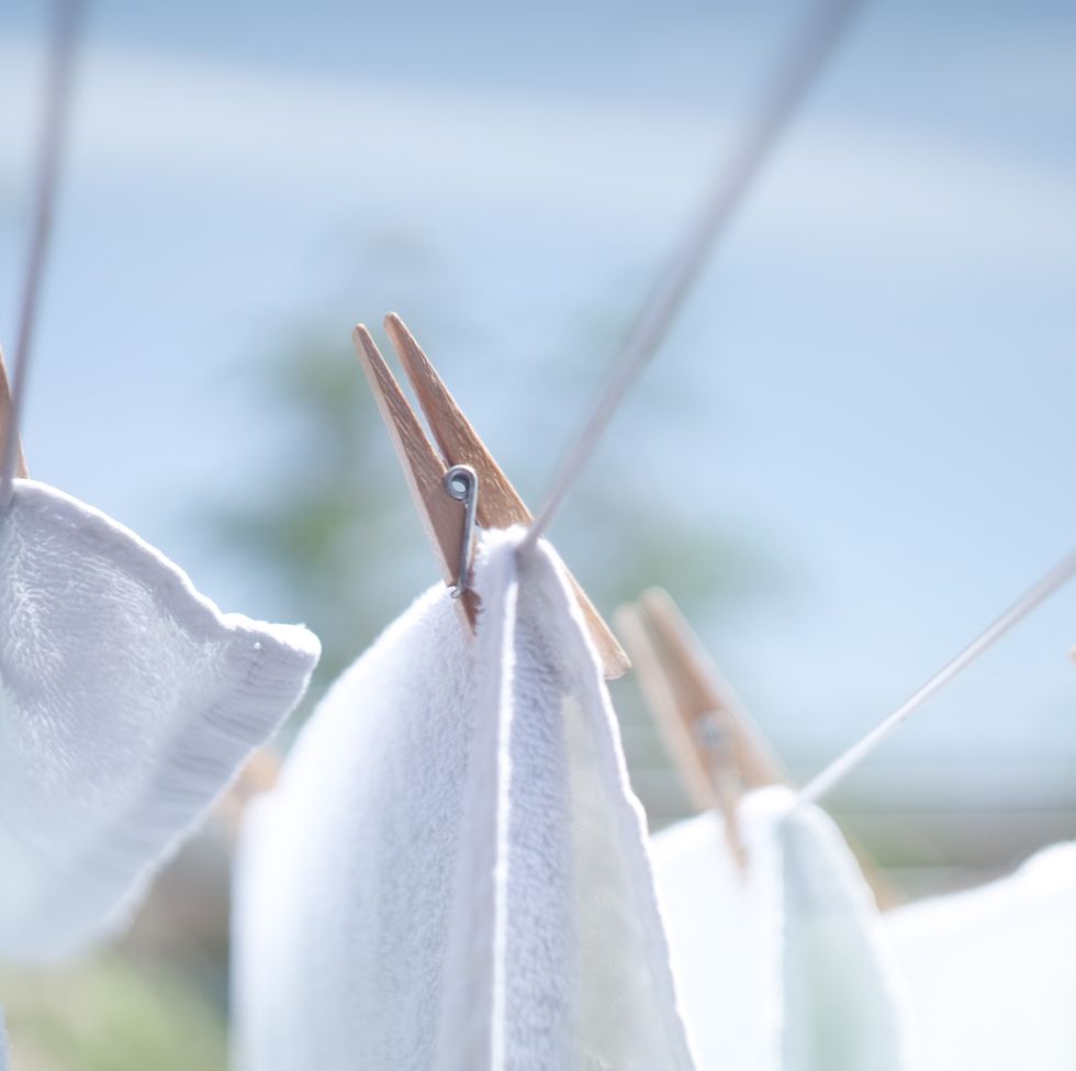 close up of clothes drying on clothesline