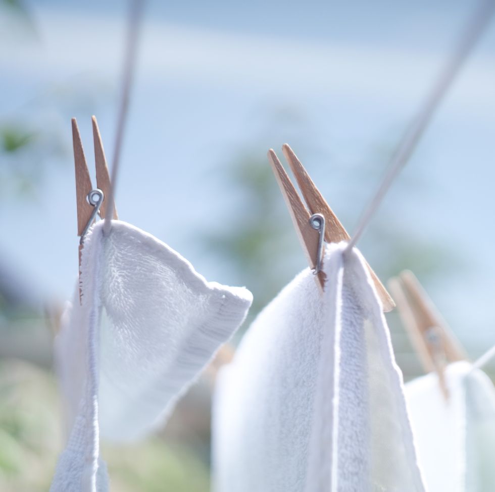 close up of clothes drying on clothesline