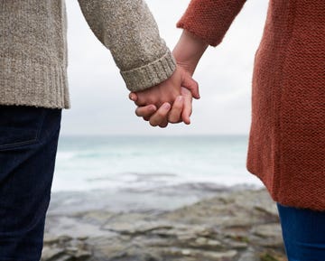 two people holding hands